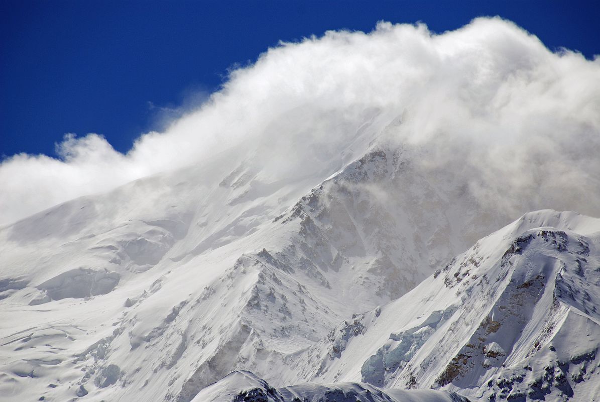 29 Shishapangma North Face In The Clouds From Ridge Above Shishapangma North Advanced Base Camp Shishapangma North Face in the clouds from the ridge (5790m) above Shishapangma North Advanced Base Camp.